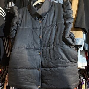 Women's Black Puffer Vest With Ruffle Detail